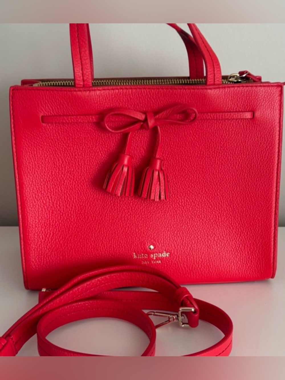 kate spade Red Leather Satchel with Tassel Bow